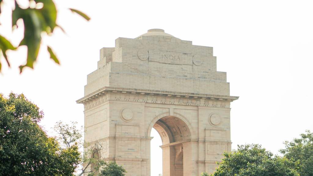 India Gate in New Delhi framed by trees
